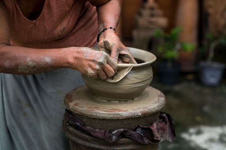 Handcrafted pottery drying in the sun